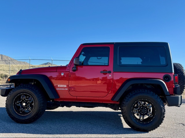 2012 Jeep Wrangler “Sport” Sport Utility 2D